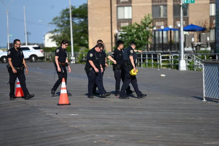 police on coney island boardwalk after shooting violence