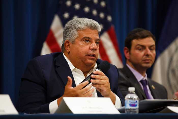brooklyn district attorney eric gonzalez speaking subway token booth murder
