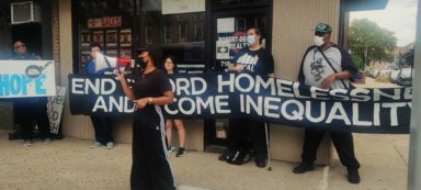 protestors at voucher discrimination protest at defalco realty in bay ridge