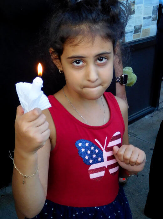 girl at vigil for dereck chen
