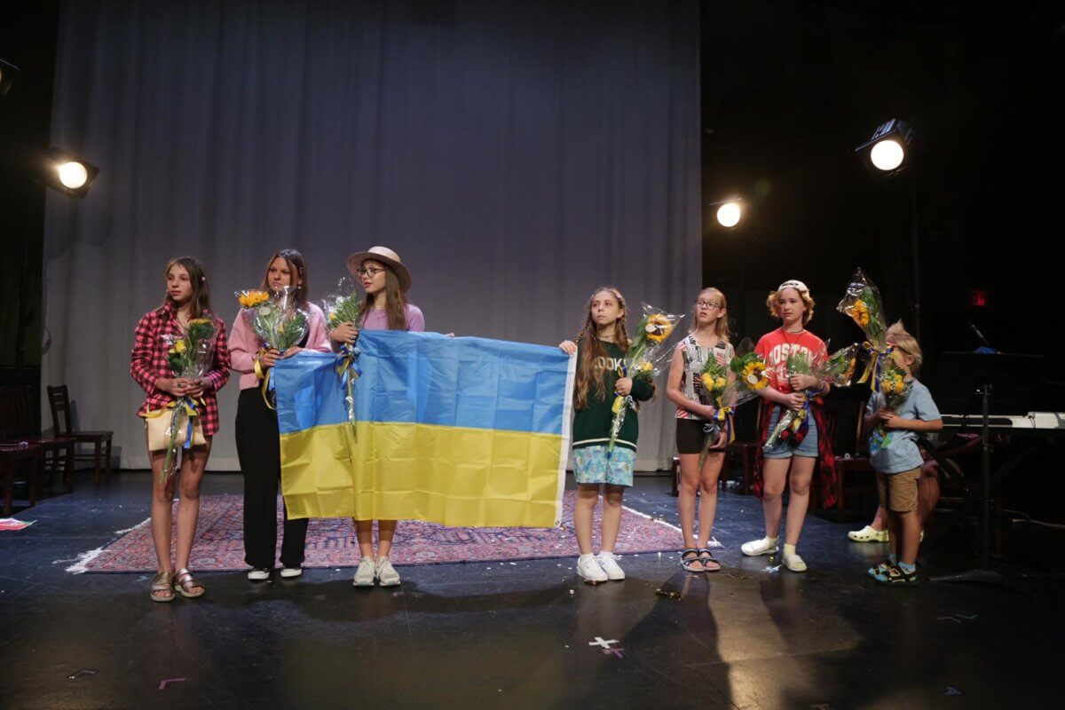 young ukrainian actors at irondale with flag