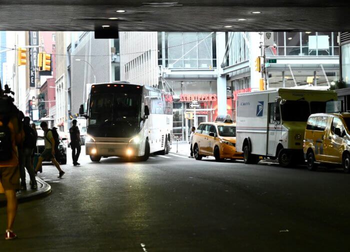 bus of asylum seekers arrives at port authority