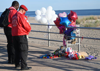 A vigil was held at West 35 and the boardwalk on Thursday evening after three children were killed by their mother on Monday, Sept 12.
