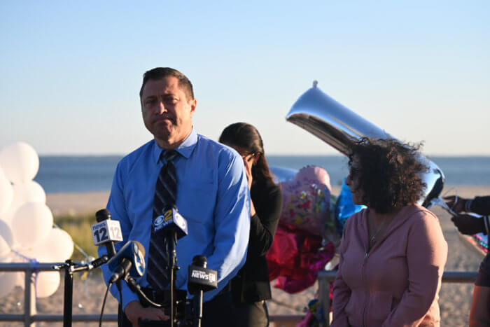 A vigil was held at West 35 and the boardwalk on Thursday evening after three children were killed by their mother on Monday, Sept 12.