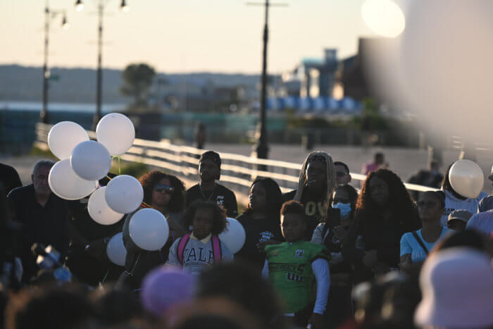 Young teammates wore their uniforms and sang game chants at the vigil.