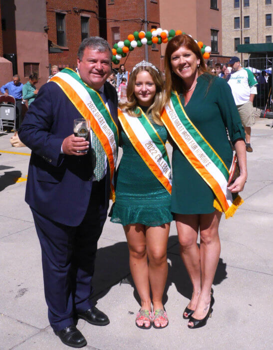 great irish fair honorees pose in irish flag sashes