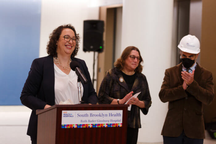 south brooklyn health ceo at podium at hospital unveiling