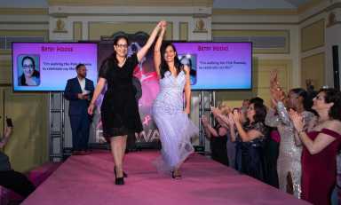 women on pink runway