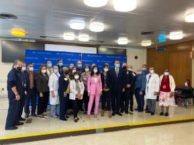 people pose for photo at south brooklyn health