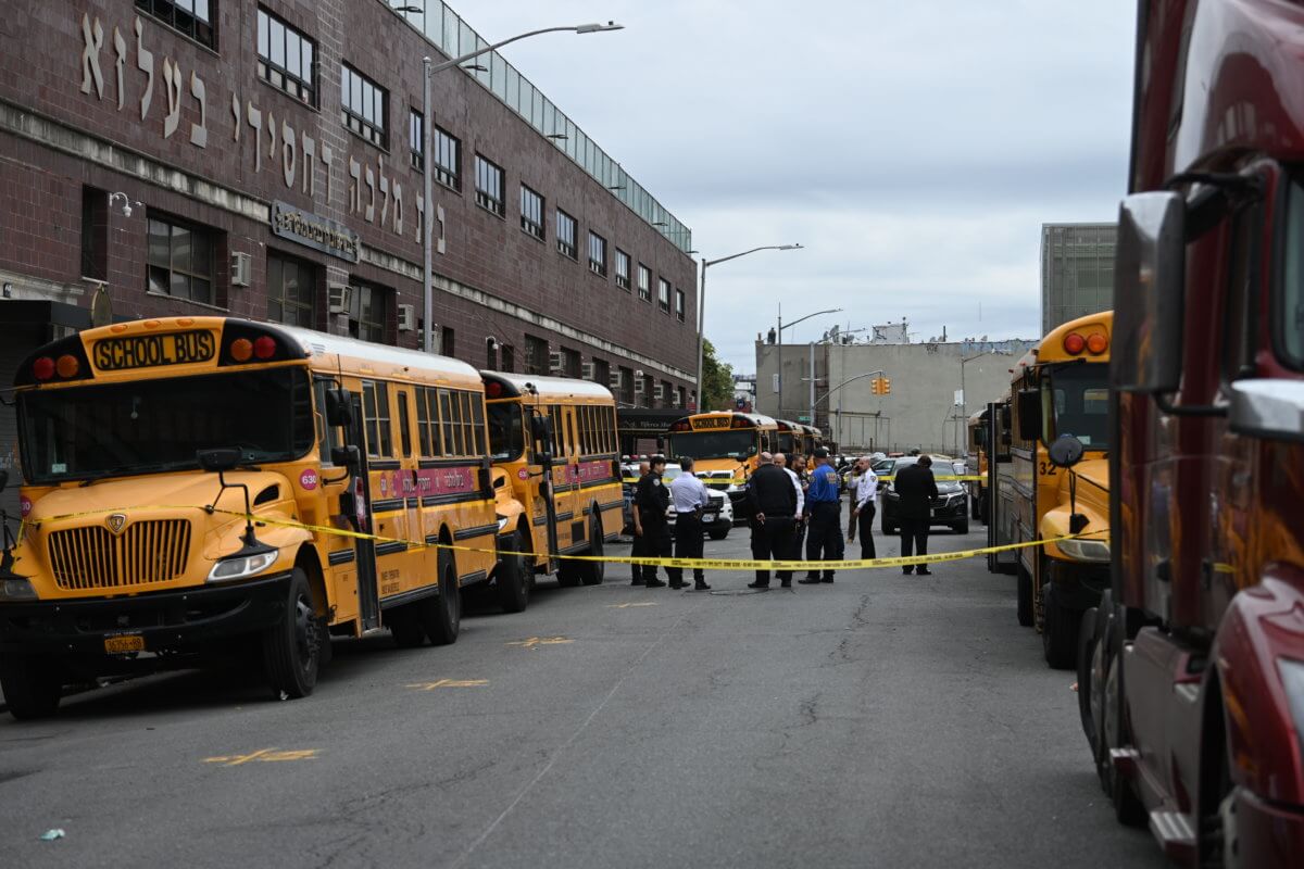 Police find man with gunshot wound on school bus