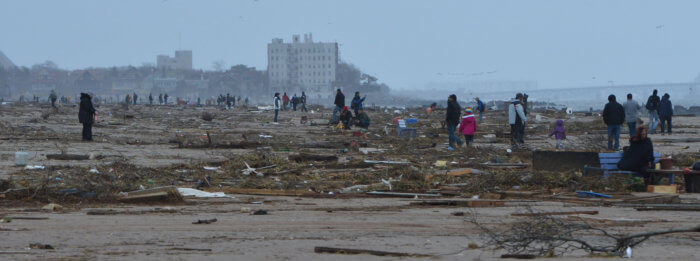 coney island beach covered in wood and debris after sandy