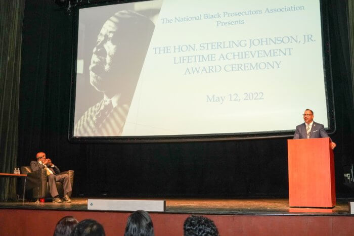 sterling johnson jr on stage receiving award