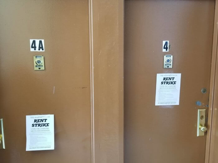 rent strike fliers on sterling place doors