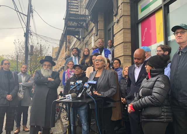 maritza davila at press conference addressing kill elected officials graffiti