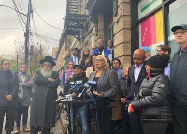 maritza davila at press conference addressing kill elected officials graffiti