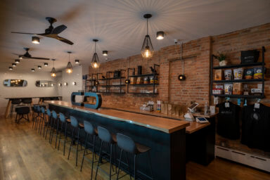 bar with stools and bottles at beer witch