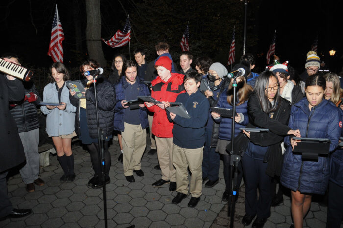 Xaverian High School Chorus and carolers from the Guild for Exceptional Children in Bay Ridge led the crowd in holiday classics. 
