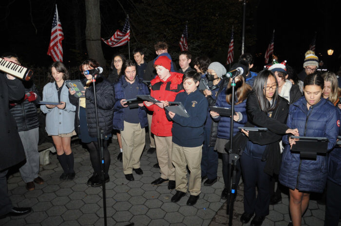 Xaverian High School Chorus and carolers from the Guild for Exceptional Children in Bay Ridge led the crowd in holiday classics.
