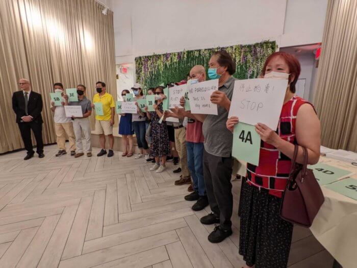 345 ovington ave tenants hold signs about bay ridge landlord