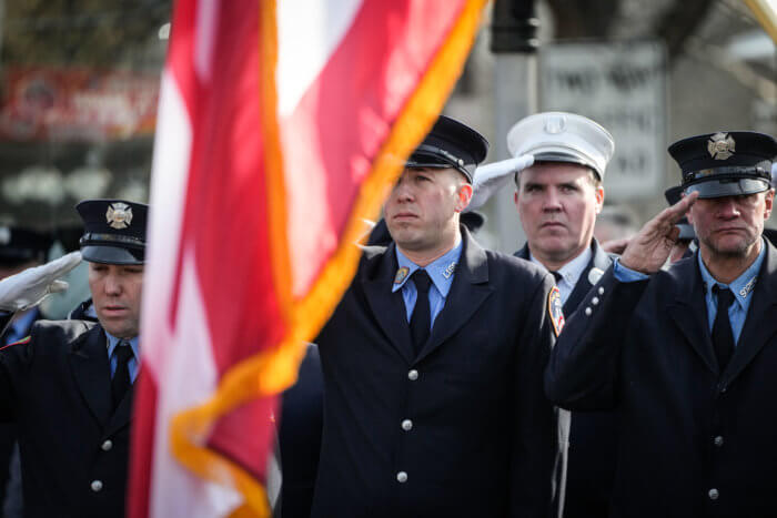 people salute at funeral of william moon