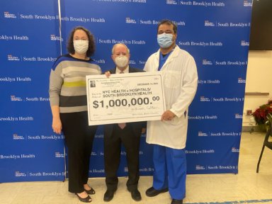 NYC Health + Hospitals/South Brooklyn Health received a ceremonial check for $1 million for cardiology equipment from Assemblymember William Colton on Dec. 14.