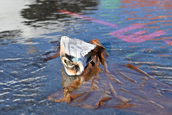 burned shoe outside warehouse fire