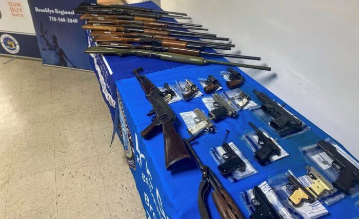 guns at gun buyback on table