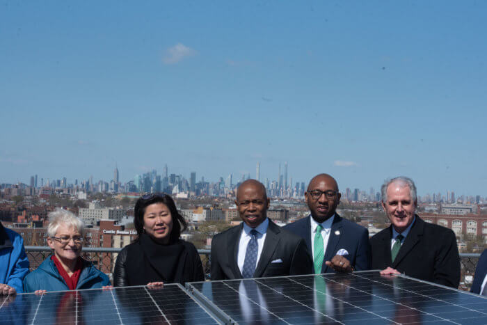 eric adams with solar panels