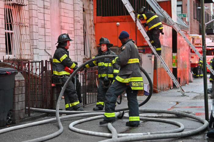 firefighters outside 265 penn street after fire