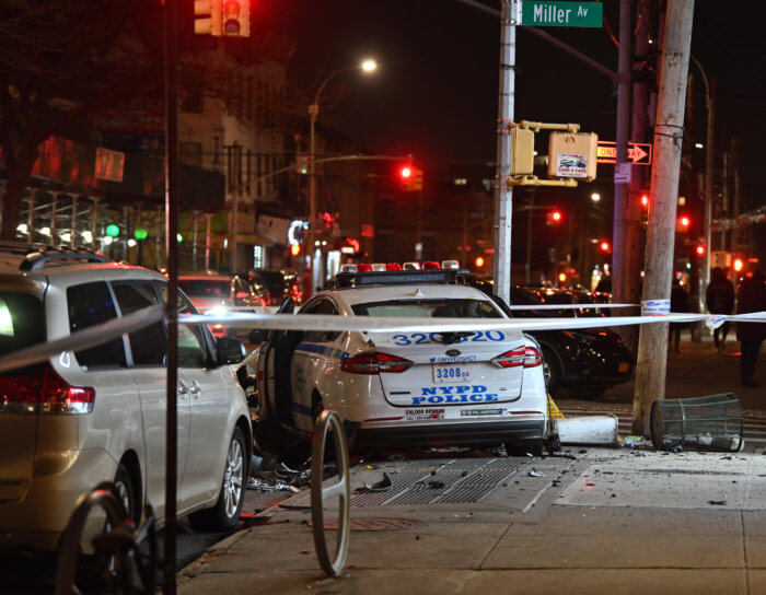 The aftermath of the crash at the intersection of Pitkin Avenue and Miller Avenue.