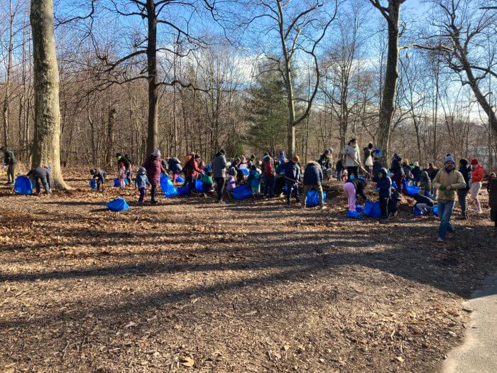 Nearly 100 volunteers spent the day cleaning up Brooklyn's biggest park.