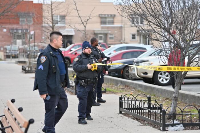 Police canvass the area after the stabbing of teenager Nyheem Wright in Coney Island.