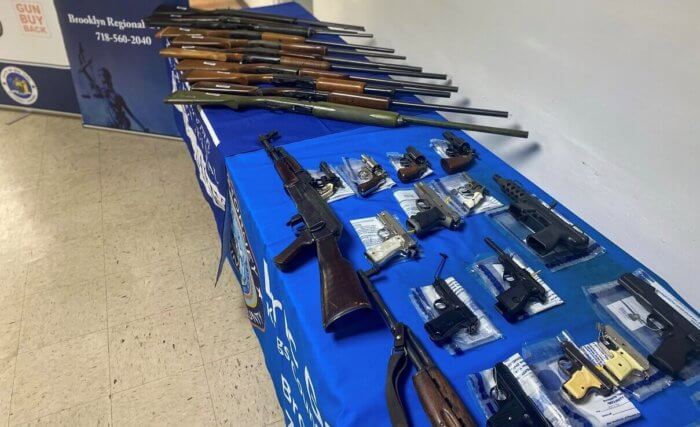 guns on table after buyback 