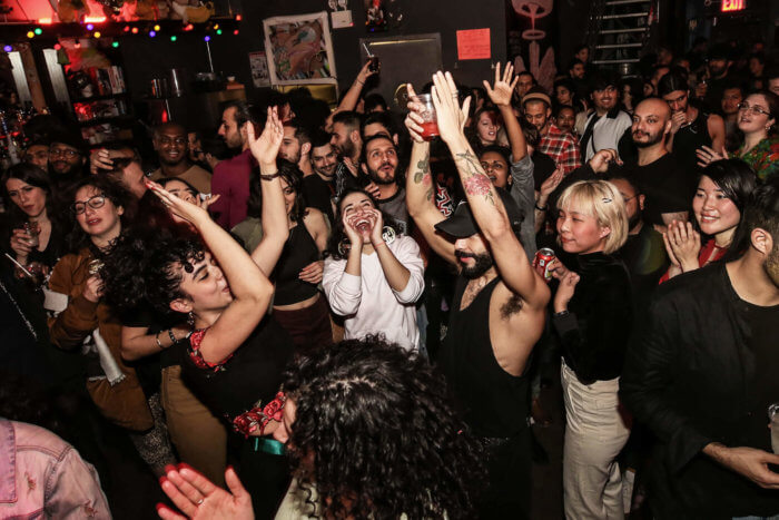 people dance to middle eastern music at a yalla party event