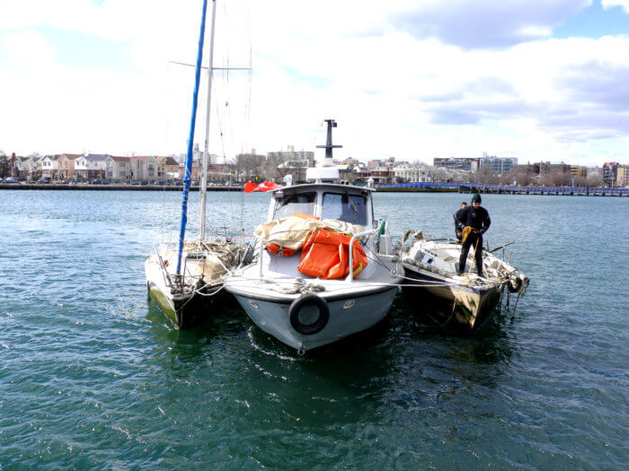 Parks Department employees show off their latest catch in Sheepshead Bay.