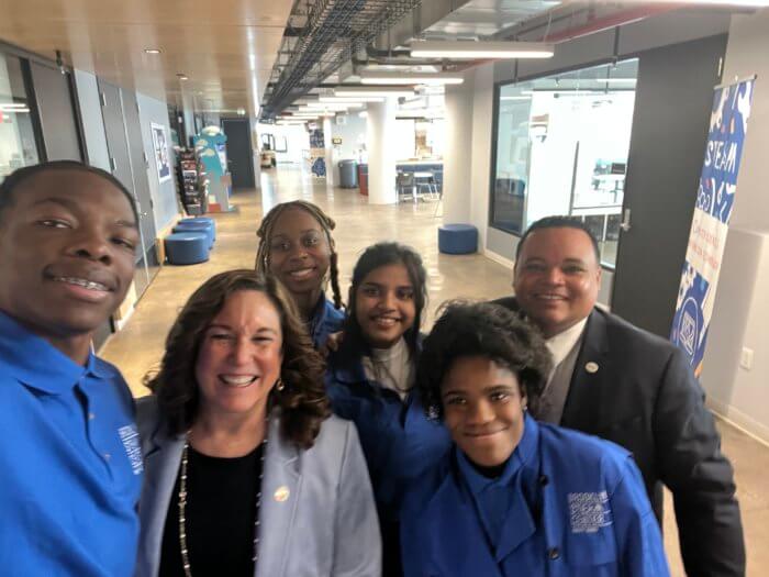 Students snap a selfie with U.S. Deputy Secretary of Education and Dr. Kayon Price during the tour.