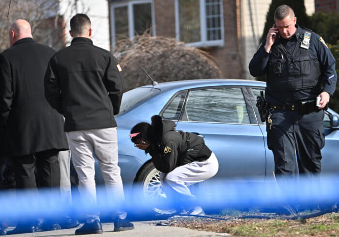 A distraught onlooker reacts to the shooting. 