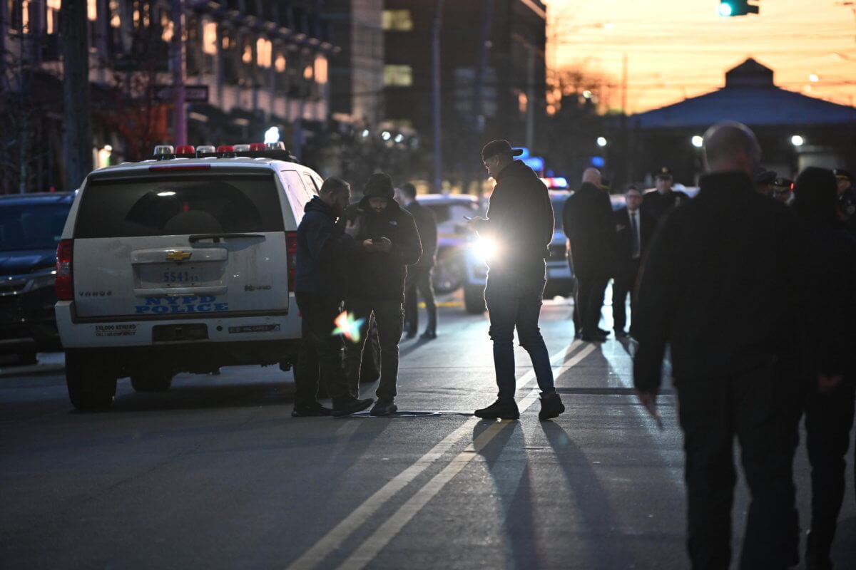 Police investigate the scene near 3222 Mermaid Ave in Coney Island on Friday.