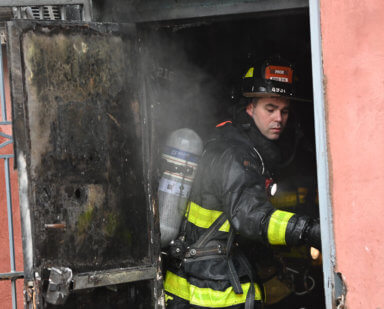 Firefighters battle the blaze at 19 Throop Avenue in Williamsburg.