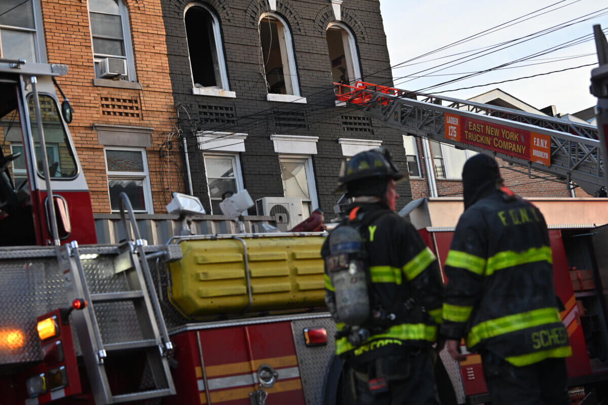 firefighters in scene of three-alarm fire in east new york