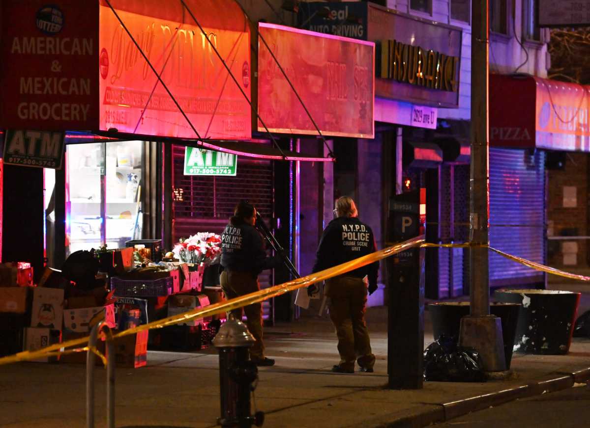 Cops secure the scene of the shooting in Sheepshead Bay.