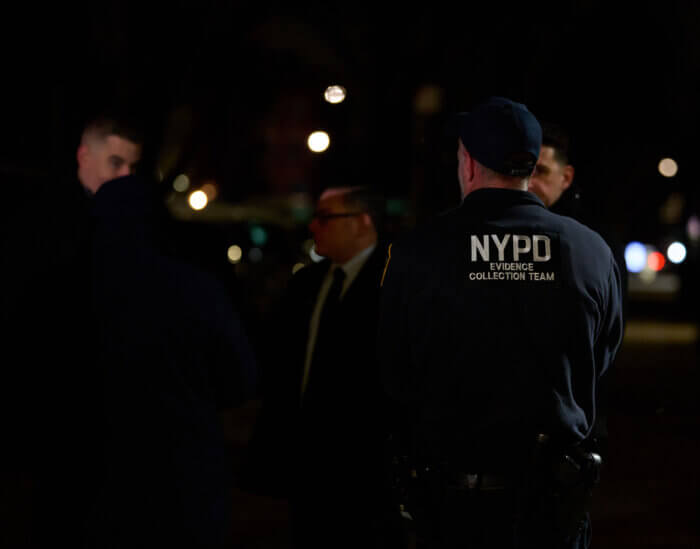 police officers after crown heights bus shooting