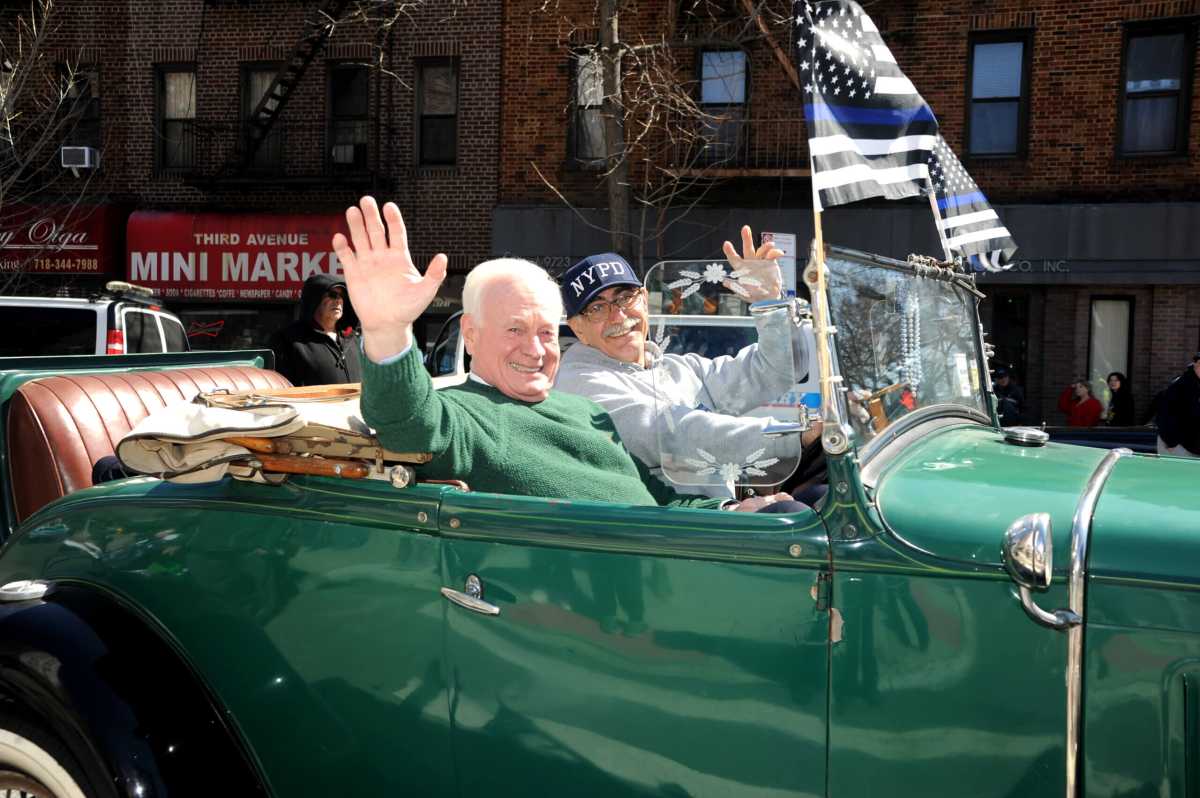 Parade participants drive through Bay Ridge during the St. Patrick's Day celebration.