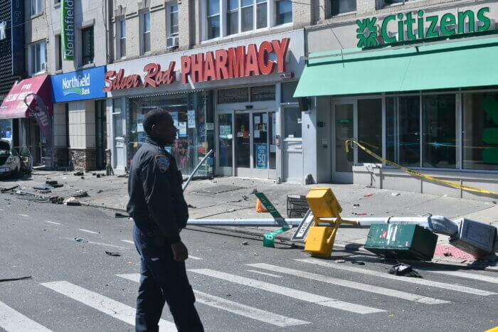 A street lamp was knocked down in the wreckage in Bensonhurst.
