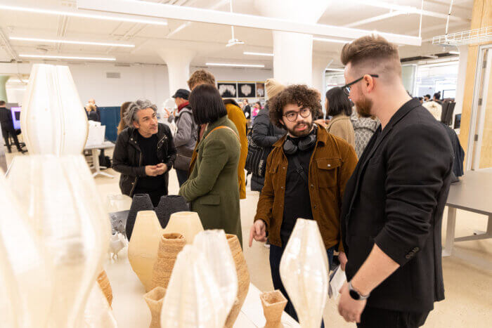 Visitors see some of the new research that will be done at the Pratt facility.