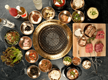 Korean food on a table at Atti, downtown Brooklyn