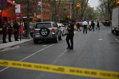 A 36-year-old man was shot in the head inside of a parked vehicle in Crown Heights.
