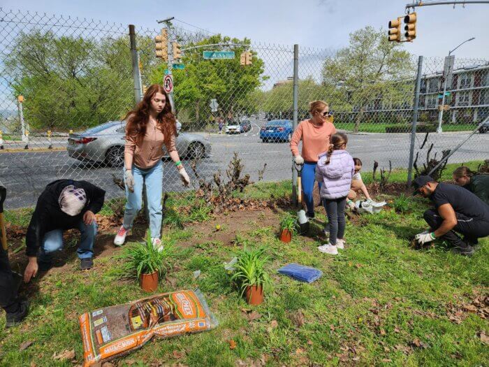 Volunteers picked up litter, raked the area and replanted over 150 flowers and plants.