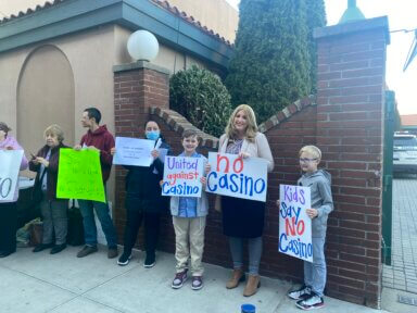 A crowd of Coney Islander's gather outside a meeting hosted by CB13 protesting a potential casino in the area.