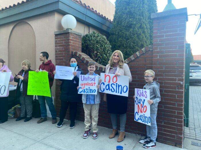 A crowd of Coney Islander's gather outside a meeting hosted by CB13 protesting a potential casino in the area.